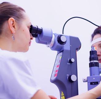 Woman receiving medical eye care.